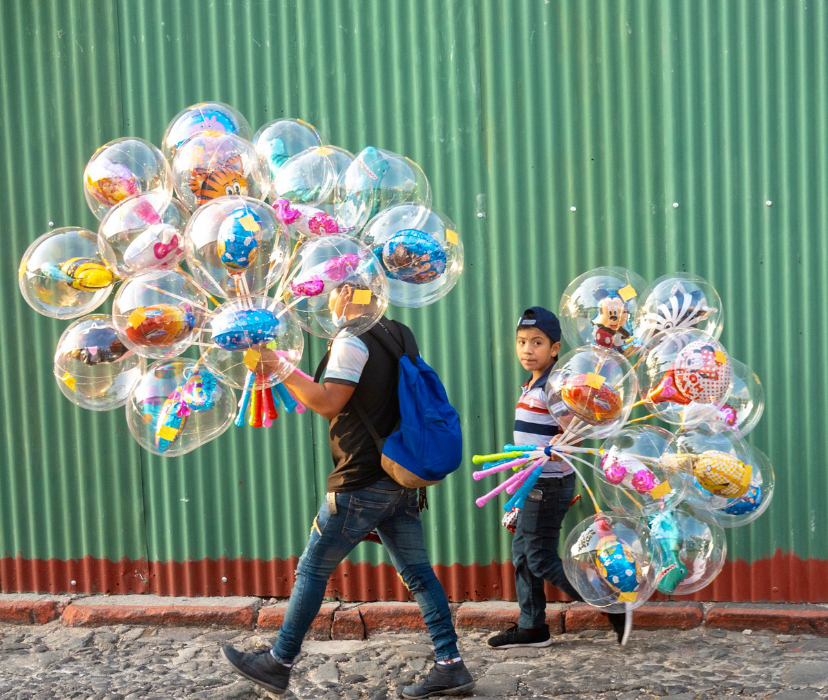 "Traveling Balloon Salesman" Antigua, Guatemala by Stephanie Jolluck